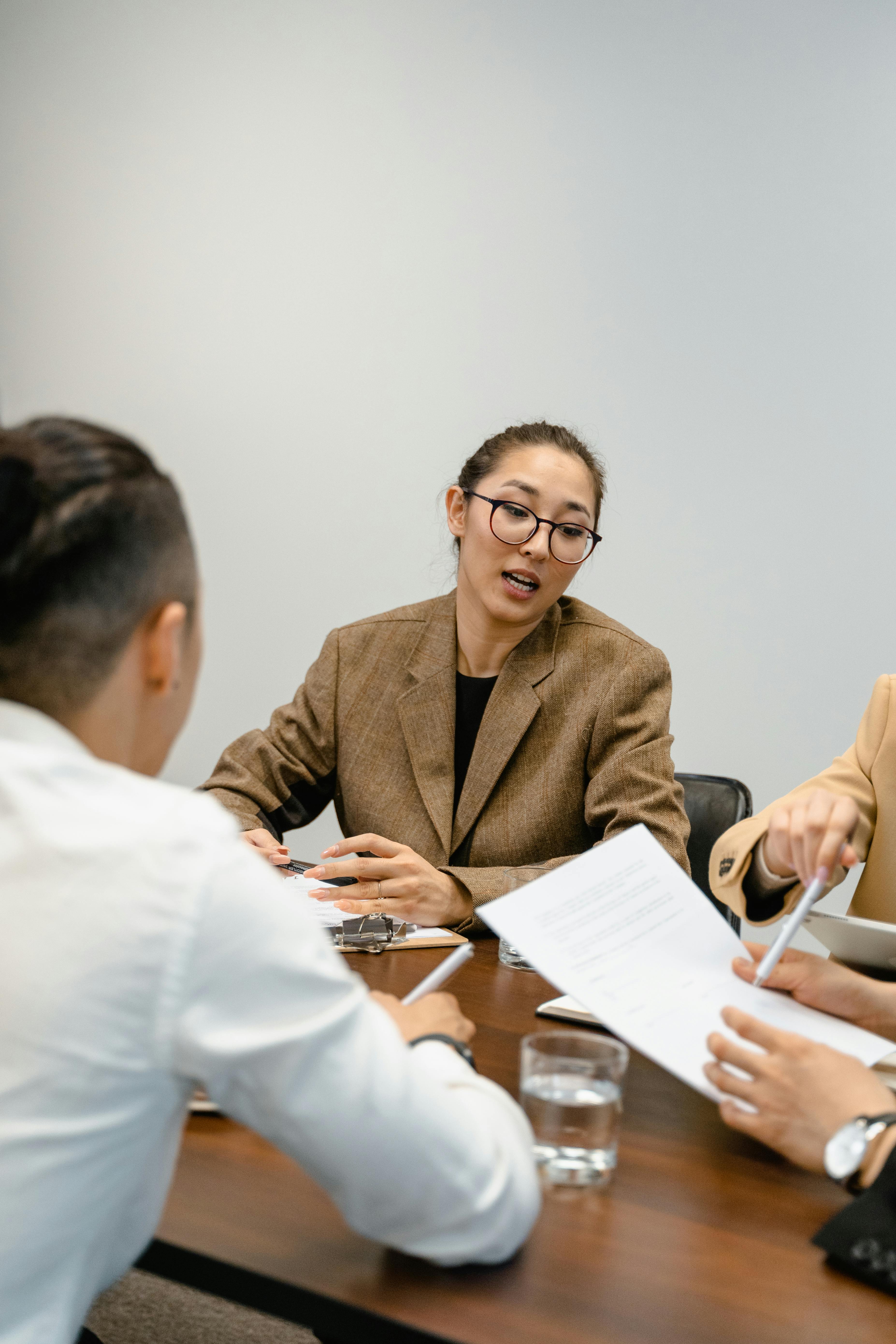 Adviser reviewing business documents and package options